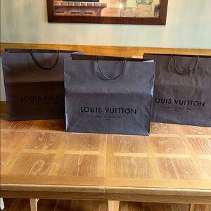 Three Louis Vuitton chocolate brown Luxury Shopping Bags